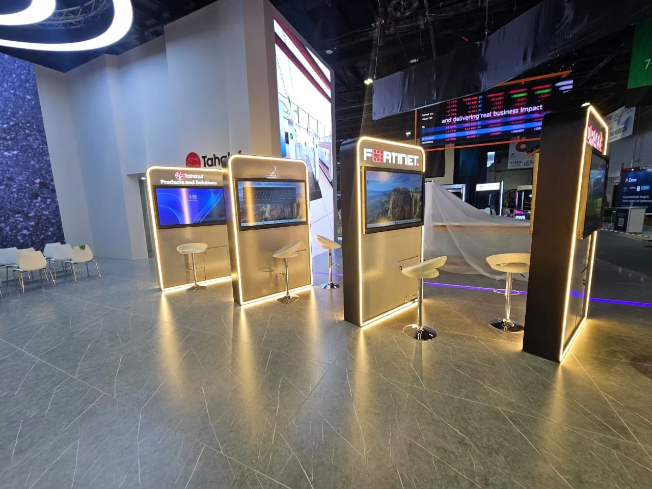 Tahaluf Al Emarat exhibition stand display stations at GITEX Global 2025, Dubai World Trade Centre, built by Nova Elite