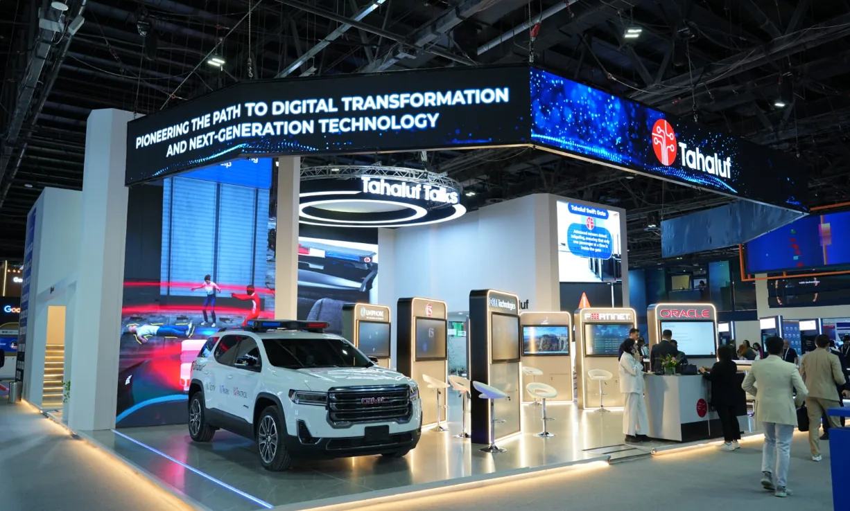 Tahaluf Al Emarat exhibition stand overhead LED branding at GITEX Global 2025, Dubai World Trade Centre, built by Nova Elite